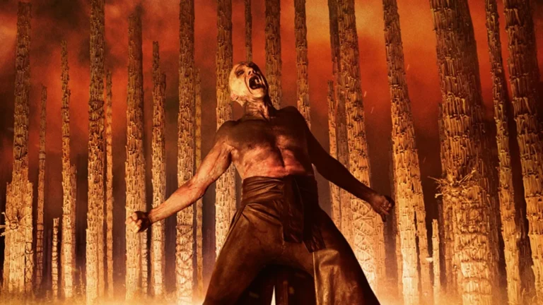 20250903-ralph-fiennes-em-cenario-em-chamas-de-exterminio-o-templo-dos-ossos